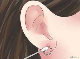 How To Treat An Infected Ear Piercing Ear Piercings Ear Piercing Care Infected Ear Piercing