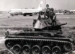 Arvin Tank Patrolling The Runways At Tan Son Nhut Airport Sai Gon Saigon During The Tet Offensive With A Pan American Clipper In The Bac National Airlines Boeing 707 Pan Am