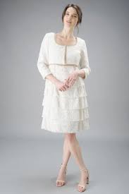 La robe est doublée et se ferme au dos par un zip. Ensemble Robe Et Veste En Tweed Cyliane Weill