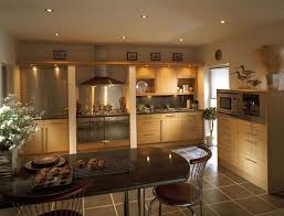 These before and after kitchen makeover pictures show what a difference painting your kitchen cabinets can make to the overall look of your. Lighting Beech Kitchen Kitchen Colors Kitchen Furniture Design