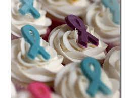 Basic chocolate and yellow cupcakes with homemade chocolate and vanilla classic buttercream. Donated These To A Local Relay For Life Kickoff Gala Vanilla Cupcakes With Buttercream Icing And Ribbons Make From Candy Melts In The Color Cakecentral Com