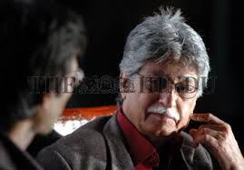 Mohammad Ali Baig (left) in conversation with writer Javed Siddique at the  Qadir...