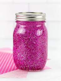 You can easily decorate mason jars for gifts by tying colorful ribbon or twine around the rim of a glass and attaching a gift tag—we'll show you how. Pink Glitter Jar Instructions Fireflies And Mud Pies