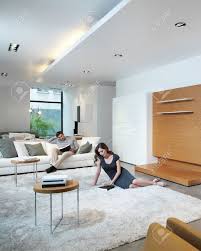 Another option would be to have the guests take home the centerpieces at the end of the night. Young Couple Relax At Home In Modern And Bright Living Room Stock Photo Picture And Royalty Free Image Image 28298214