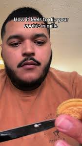 Dipping Cookie Dough in Milk