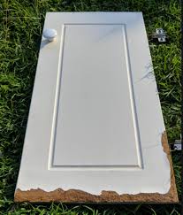 If you decide to just lay a new piece of wood on top here's a suggestion. Rescue Water Damaged Mdf Door Home Improvement Stack Exchange