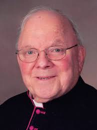 Pizzamiglio, Reverend Monsignor Ernest