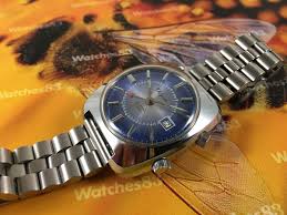 I did not find much about the manufacturer except it is swiss and may have organized in 1900. Valgine Vintage Swiss Watch Wrist Alarm Manual Winding 17 Rubis Dial Blue Valgine Vintage Watches Watches83