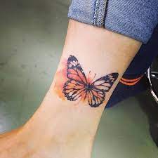 Watercolor Style Butterfly Tattoo On The Ankle Butterfly Tattoo Designs Butterfly Tattoo Watercolor Butterfly Tattoo