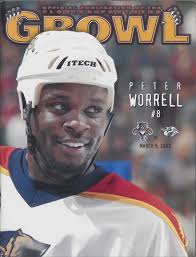 WORRELL GRINS ON 2002 PANTHERS PUB COVER