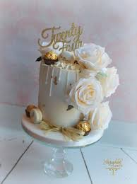 Glam 24th Birthday 26th Birthday Cake For Her White And Gold Drip Cake With Ferrero Rocher And Silk Roses By Storeybook Cakes Dripcakes 25th Birthday Cakes White Birthday Cakes 21st Birthday Cakes