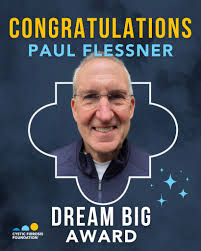 At VLC, we honored Paul Flessner, former senior executive at Microsoft and  CF Foundation champion, with the Dream Big Award. When Paul learned the CF  Foundation was raising funds to support a