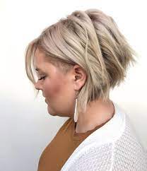 While many mullet hairstyles are typically longer, this one features short hair on a woman over 70 with all the body and short layers up top forming a v at the hairline. The Most Flattering Short Medium And Long Haircuts For Double Chins