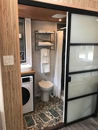 Interview Living In An Expanding Off Grid Tiny House Tiny House Bathroom House Bathroom Designs Off Grid Tiny House