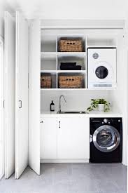 Open hanging rod for freshly pressed shirts and blouses. 55 Beautifully Inspiring Laundry Room Cabinets Ideas