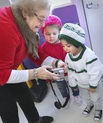 Knitters deliver handmade joy to preschoolers