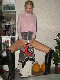 Beautiful blonde milf in transparent dress at home — Russian Sexy Girls