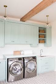 Some use the natural beauty and grain of the wood as the main decor, but. Coastal Blue Laundry Room Design Home Bunch Interior Design Ideas