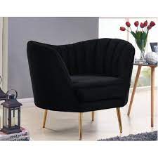Whether drawn up to your dining table or rounding out your living room with an extra seat, a small side chair like this is a great option wherever you need it. Black Velvet Channel Tufted Chair Gold Legs In 2021 Black Velvet Chair Tufted Chair Black Gold Bedroom