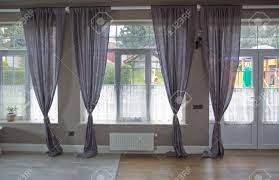Purple is a bold color, it's regal, sophisticated, and hardly goes unnoticed. Curtain Interior Decoration In Living Room With Sunlight New Stock Photo Picture And Royalty Free Image Image 123821836