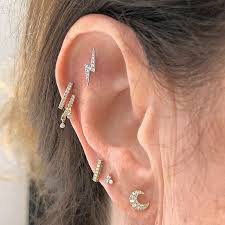 Why have one ear piercing when you can have them all? Diamond Moon Threaded Stud Maria Tash
