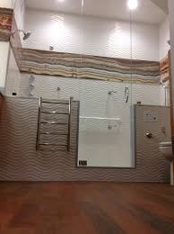 Wavy 3 D Tile Shower Surround With Beautiful Onyx Accent Stripe All Glass Steam Shower With Starphi Frameless Shower Enclosures Shower Tile Shower Surround