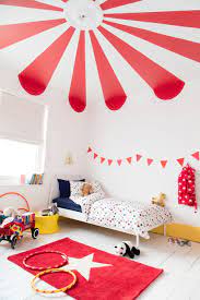 Give Your Kid S Bedroom A Circus Theme With Big Top Stripes On The Ceiling All You Need Is Pepper Red White Themed Kids Room Red Kids Rooms Yellow Kids Rooms