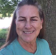 Why is swimmers' hair stiff after pool use?