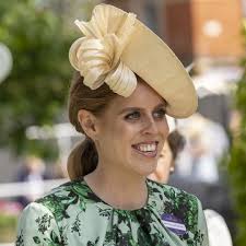 Pregnant Princess Beatrice blooms in floral wedding dress and whimsical  flower crown