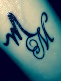 Pin By Daniela Moore On Ink Love Mine And Others Name Tattoo Designs Letter M Tattoos M Tattoos