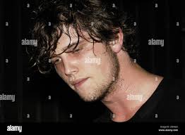 Singer Nick Atkinson from the pop band ROOSTER playing a sweaty early gig  at the Barfly in Cardiff, October 18 2004. Photograph: ROB WATKINS. INFO:  Rooster was a British rock band formed