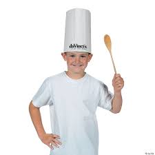 I found a huge white table cloth at a thrift store and got it half off. Chef Hats Oriental Trading