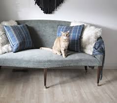 Like a sofa for your dining room: Raising A Sofa With Furniture Casters To Turn It Into A Dining Settee Bench Cuckoo4design