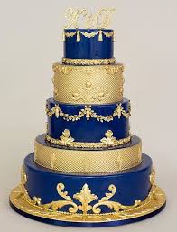 The gold cake at my sister's wedding last night. Indian Weddings Inspirations Gold Wedding Cake Repinned By Indianweddingsmag Indianweddingsm Beauty And The Beast Wedding Cake Royal Cakes Gold Wedding Cake