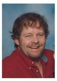 Kay and Jeff Richards at the grave of cousin Richard Miller, who would have  been 79 years old today (Sept. 9, 2018). Panguitch Cemetery. Richard's  mother Edra was the sister of my