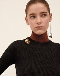 Wooden armchairs with tweed upholstery, a hardwood table with hairpin metal legs. 100 Stud Minimalist Earrings Ideas Minimalist Earrings Earrings Jewelry