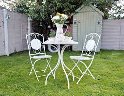 Apply a thin coat of spray metal primer onto the chair. Painting Rusty Metal Garden Furniture Dainty Dress Diaries
