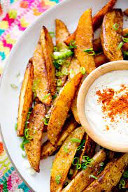 Spicy Potato Wedges With Lime Dipping Sauce Recipe Spicy Potato Wedges Appetizer Recipes Food