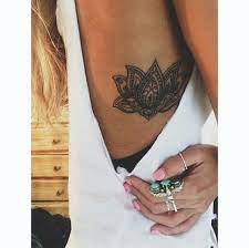 Beautiful Lotus Flower Rib Tattoo Tiny Tattoos Flower Rib Tattoo Rib Tattoo
