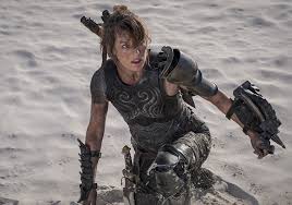 At least one version of the opening credits reads killer beach, but the closing credits give the movie title as the sand.. Milla Jovovich Behind A Machine Gun In A Teaser For The Movie Monster Hunter
