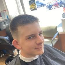 JR CHAMPIONS BARBER SHOP