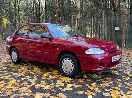 Image result for Cardinal Red 2000 Hyundai