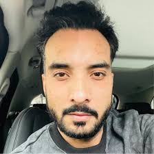 Can a RJ2 controller from one FANUC robot be used with another model?