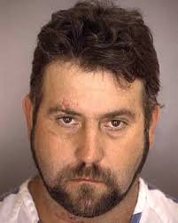 Man arrested after crashing his vehicle through Pinson service station