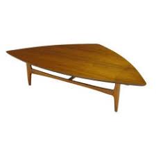 It lets you create a warm and inviting look with your favorite decor, collectibles, potted plants etc. Triangle Coffee Tables 14 For Sale On 1stdibs
