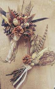 Browse through these wedding bouquets that are made from feathers, seashells, herbs and more! Wild Feather Pine Cone Bouquet Autumn Wedding Bouquet Rustic Wedding Woodland Winter Wedding Bouquet Rustic Wedding Flowers Bouquet Fall Wedding Bouquets