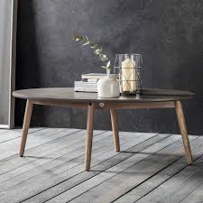 This coffee table's understated design and neutral brown finish make it a perfect fit in most styles and color schemes. Large Oval Coffee Table Grace Grey
