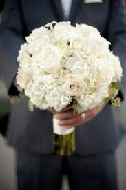 Wonderful White Round Bridal Bouquet Featuring White Hydrangea White Roses White Stephanot White Wedding Bouquets Simple Bridal Bouquets White Bridal Bouquet