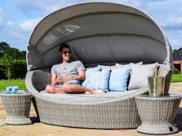 Whimsical bent rattan design on floating platform base. Rattan Daybeds With Shade Gardenman Co Uk