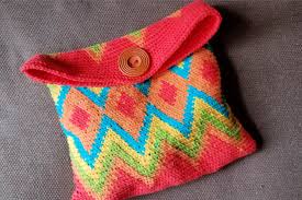 Tapestry crochet is a lot of fun, and there are many gorgeous patterns available that you can use once you learn how to do it. Make A Colorful Crocheted Cosmetics Bag Using Tapestry Crochet